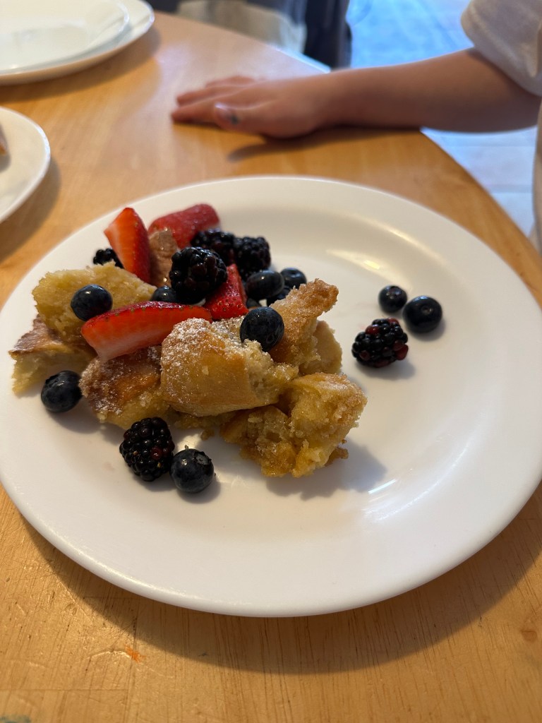 Overnight Baked French Toast served with berries